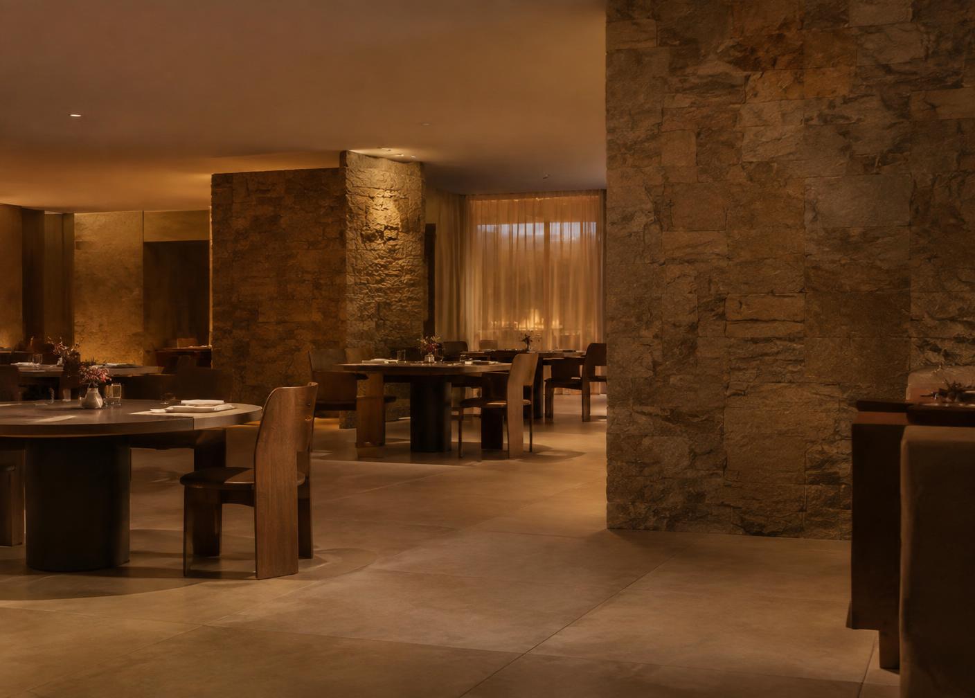 Dark stone surfaces in a dining room